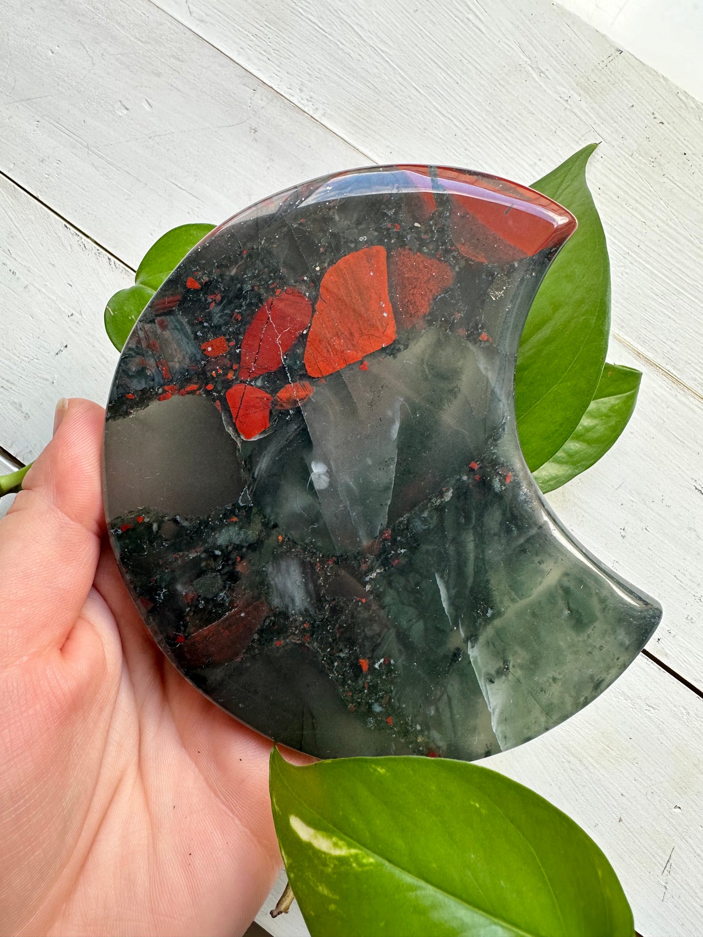 Bloodstone Moon on stand ~ Powerful ~ Courage ~ Increases Strength ~ Creativity ~ Self Love